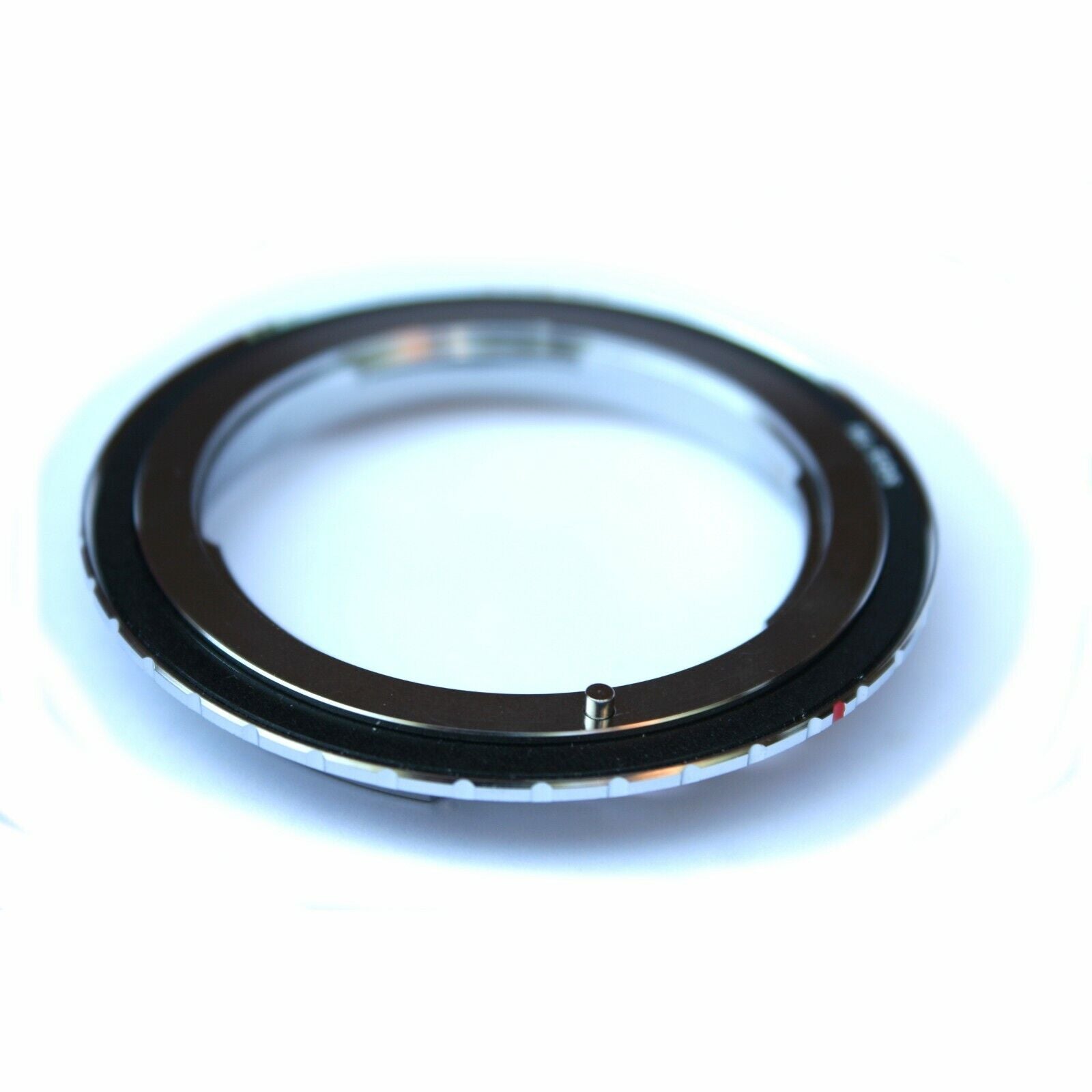 Nikon F AI AF lens to Canon EOS body adapter